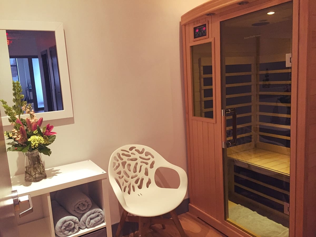 Mind Body Soul Sauna with chair and towels folded